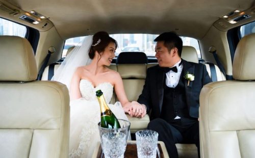 Luxury limo interior with beige leather seats, ambient lighting, chilled champagne — VIP wedding cabin, Wedding Limo Toronto.